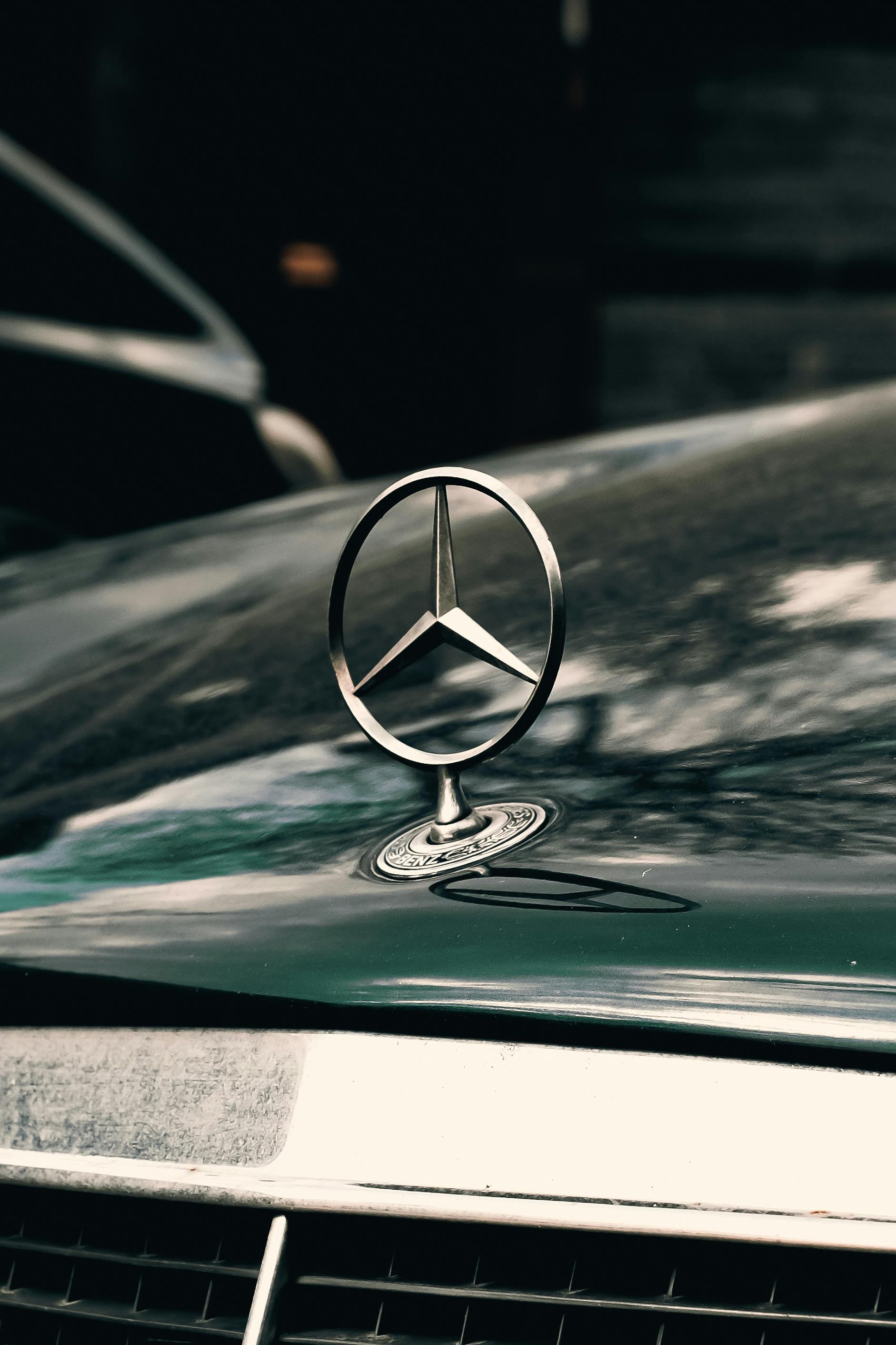 Close-up of the Symbol on a Mercedes Hood · Free Stock Photo