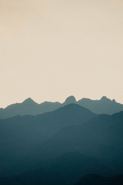Mountain silhouette under a soft gradient sky, photo by Santiago Arellano on Pexels