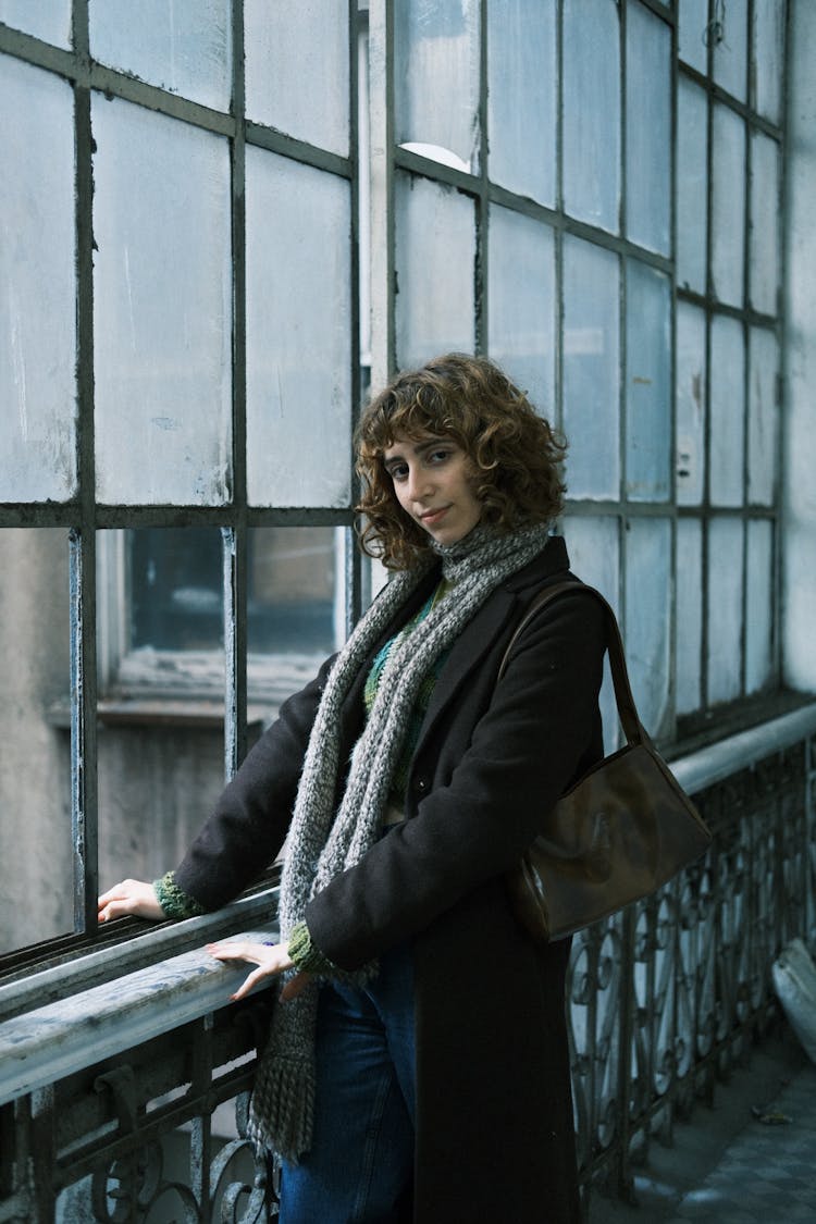 Young Fashionable Woman With Curly Hair 