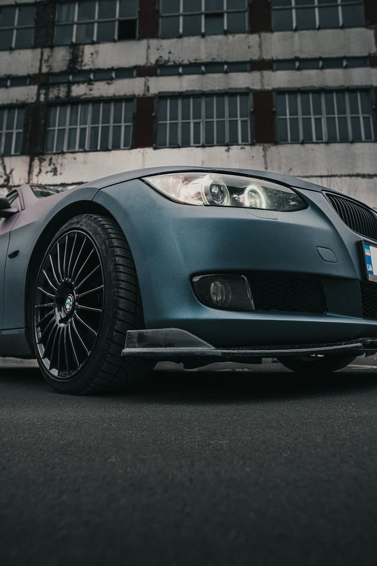 Blue BMW On A Parking 