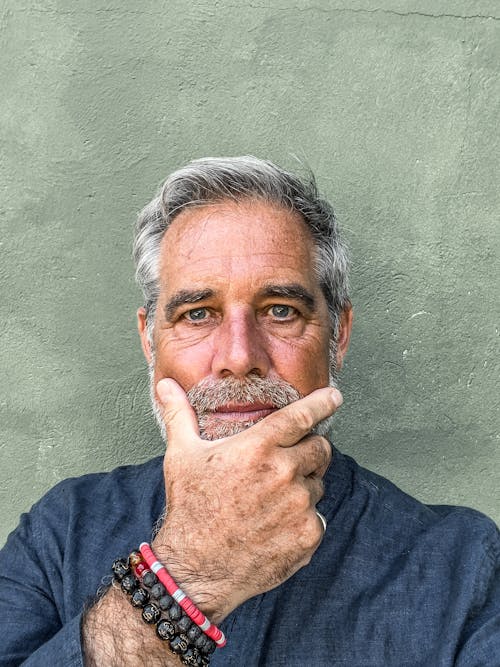 Portrait of an Elderly Man Rubbing his Beard 