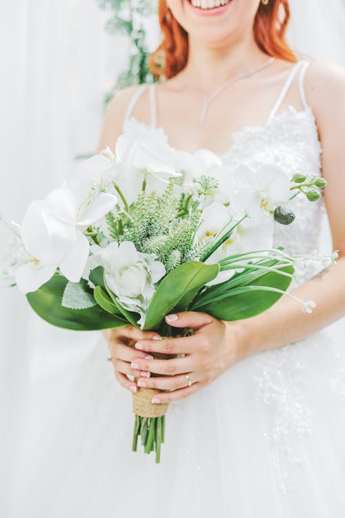 Bride with Flowers at Wedding Ceremony