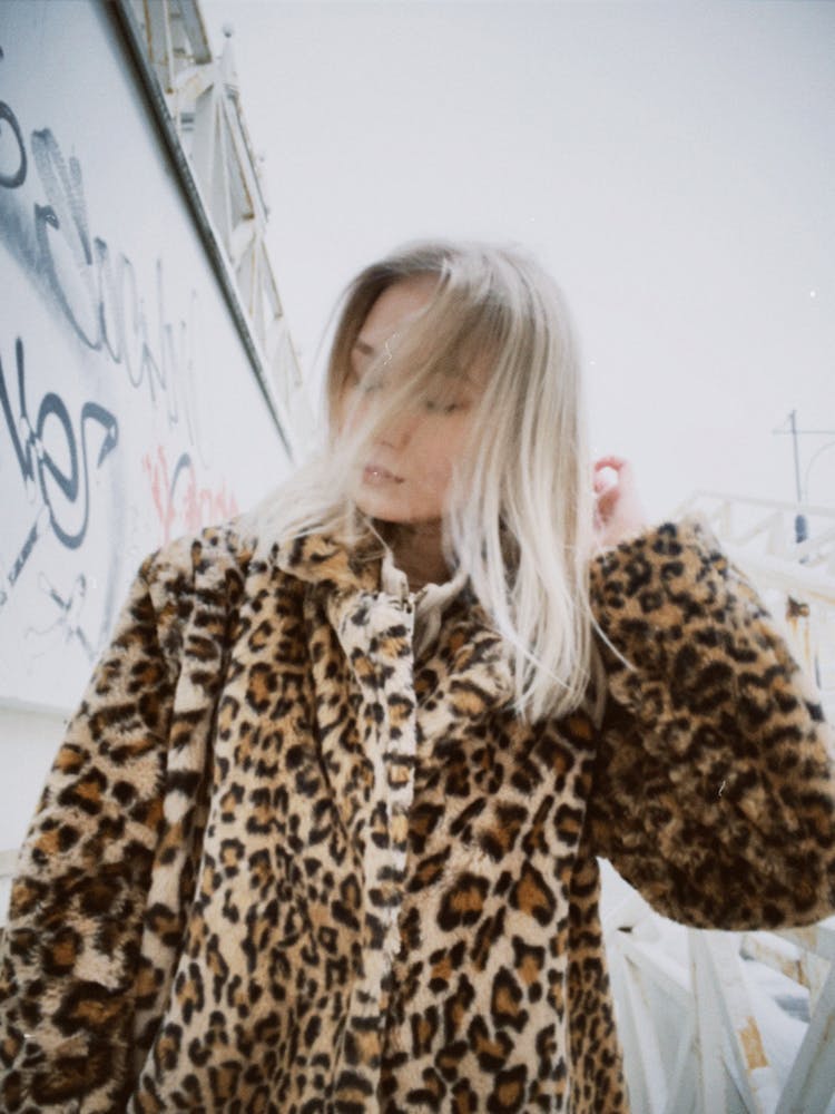 Blonde Wearing Coat In Leopard Print