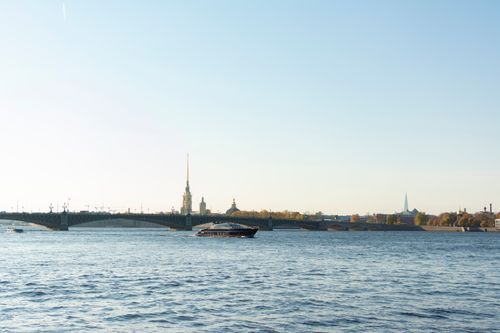 Free Idyllic scene of Saint Petersburg's bridge and river under clear skies. Stock Photo