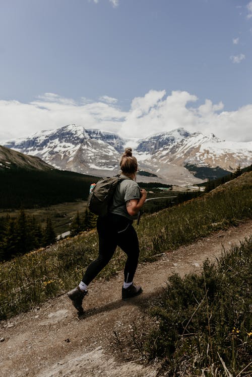 Woman Hiking in Mountains