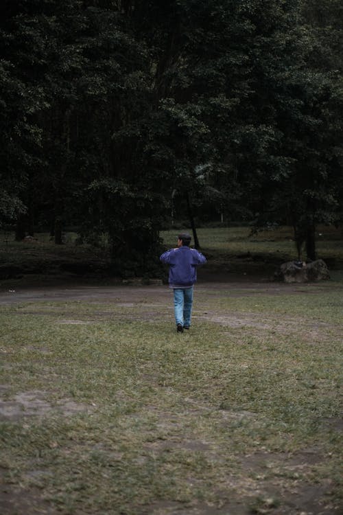 Man Walking in Park