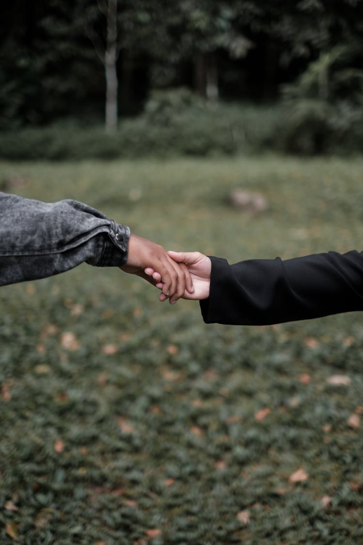 Man And Woman Holding Hands