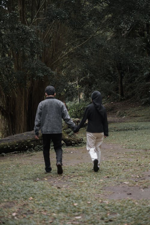 Man and Woman Holding Hands