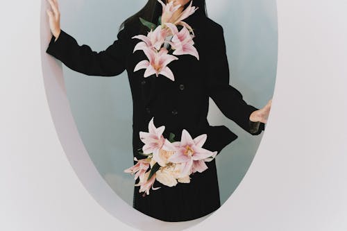 Woman in Coat with Flowers