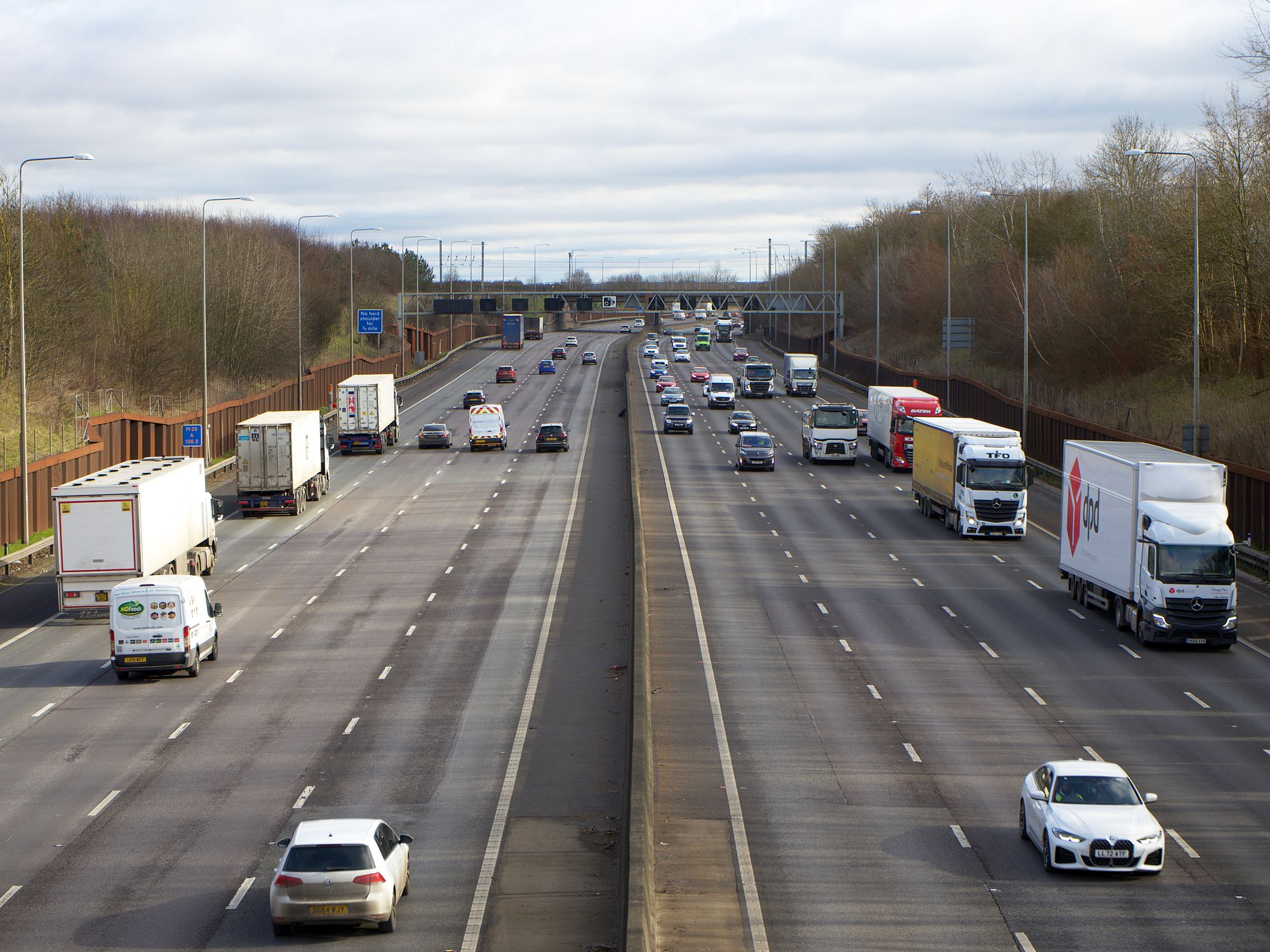 House Removals in Portsmouth, South East — removals crew carrying furniture out to the removal lorry
