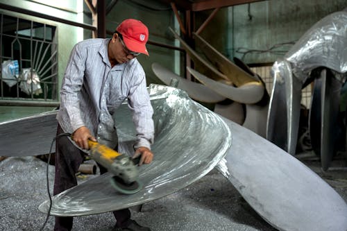 Man Grinding Propeller