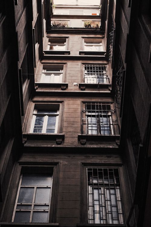 Free Captivating low angle view of urban apartment buildings showcasing architectural designs. Stock Photo