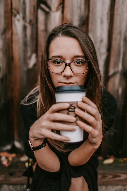 Woman Holding A Cup