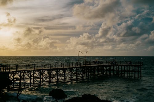 Pier on Seashore at Dusk