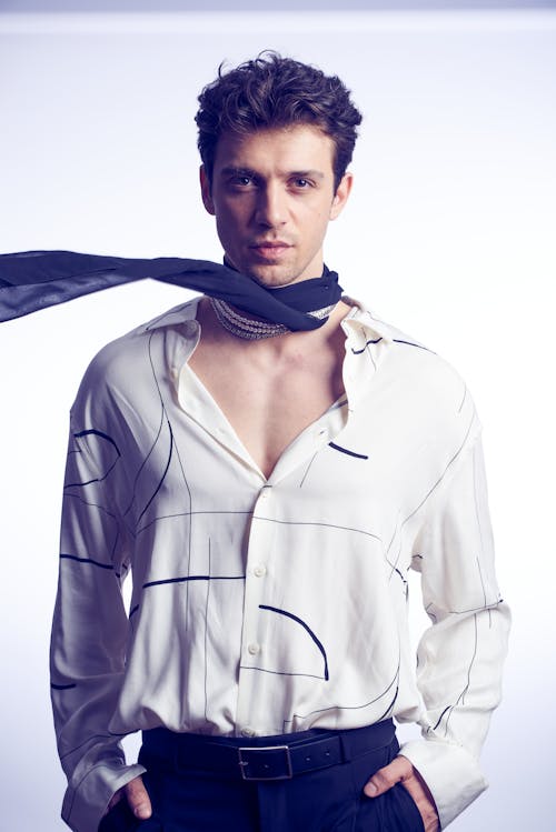 Model in a Shirt and Scarf Posing in Studio 