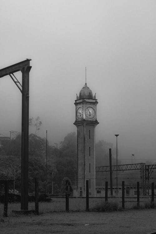 Black and White Photo of a Historic Clock Tower