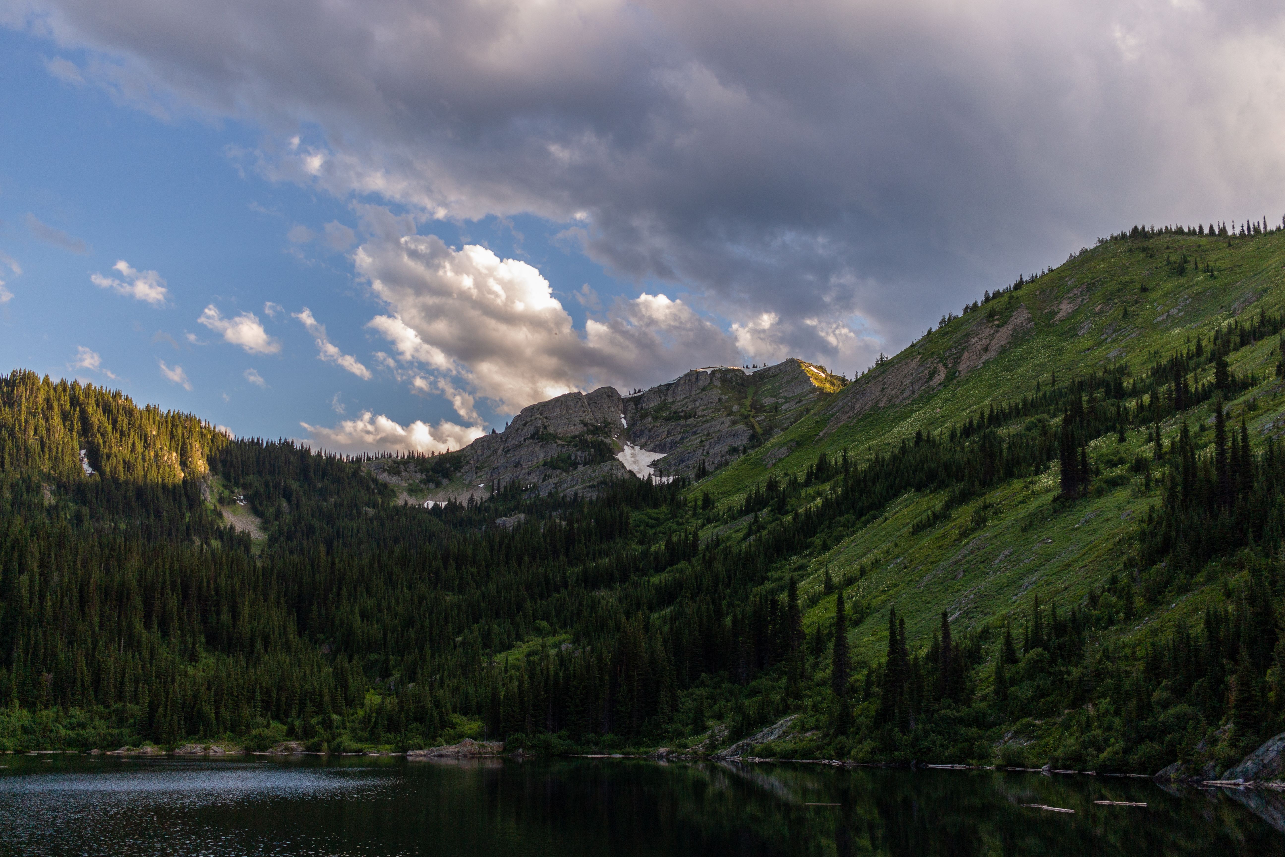 An alpine lake below granite peaks in the Bitterroot Mountains