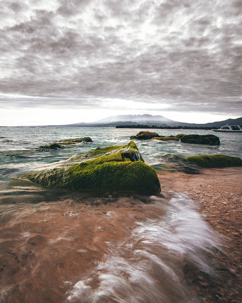 Beach Line Under Gray Clouds