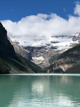 Beautiful Lake Louise with snowcapped mountains in Banff National Park, Alberta, Canada.