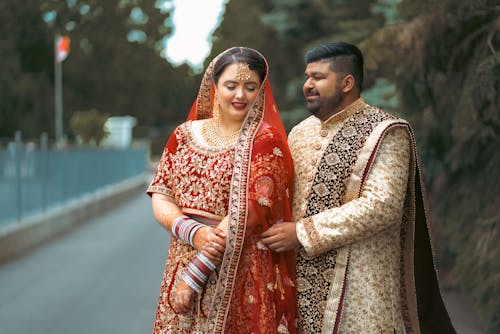 Elegant Couple in Traditional Indian Clothing on Street