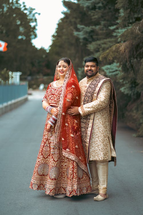 Smiling Couple in Traditional Indian Clothing