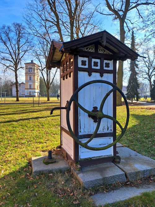 Free Charming antique well structure in a tranquil park, showcasing vintage architecture. Stock Photo