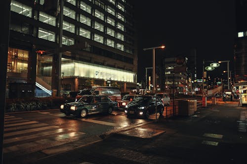 Cars on Road in Traffic at Night 