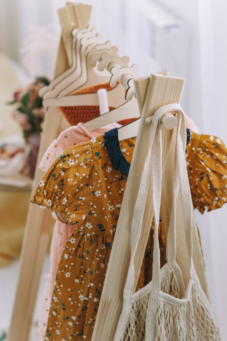 Children Clothes On Hangers In Shop