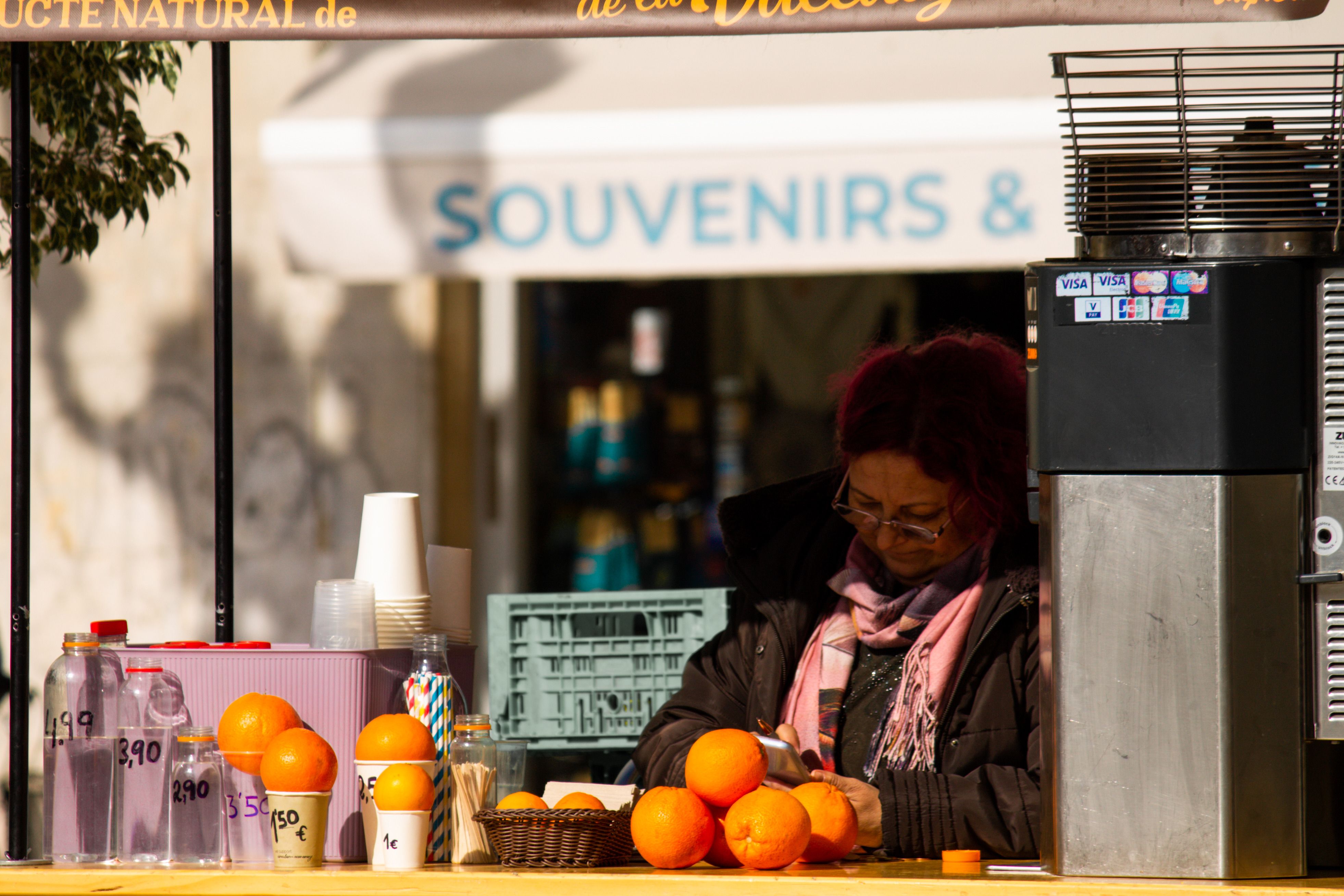 Tourist politely declining a street vendor in a Spanish market