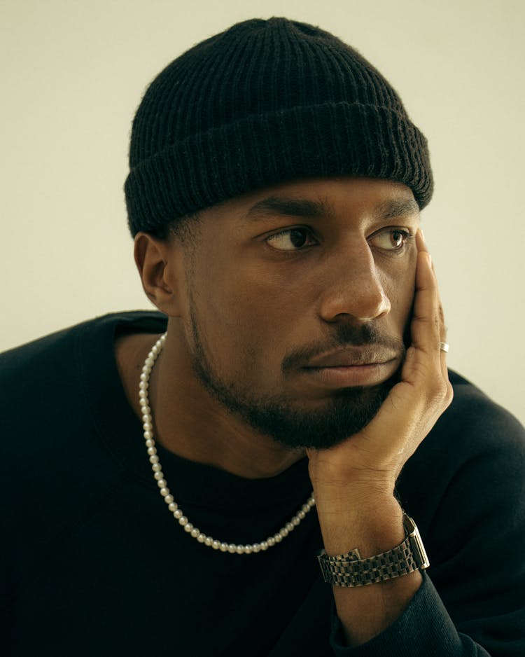 Young Man In Hat And Accessories