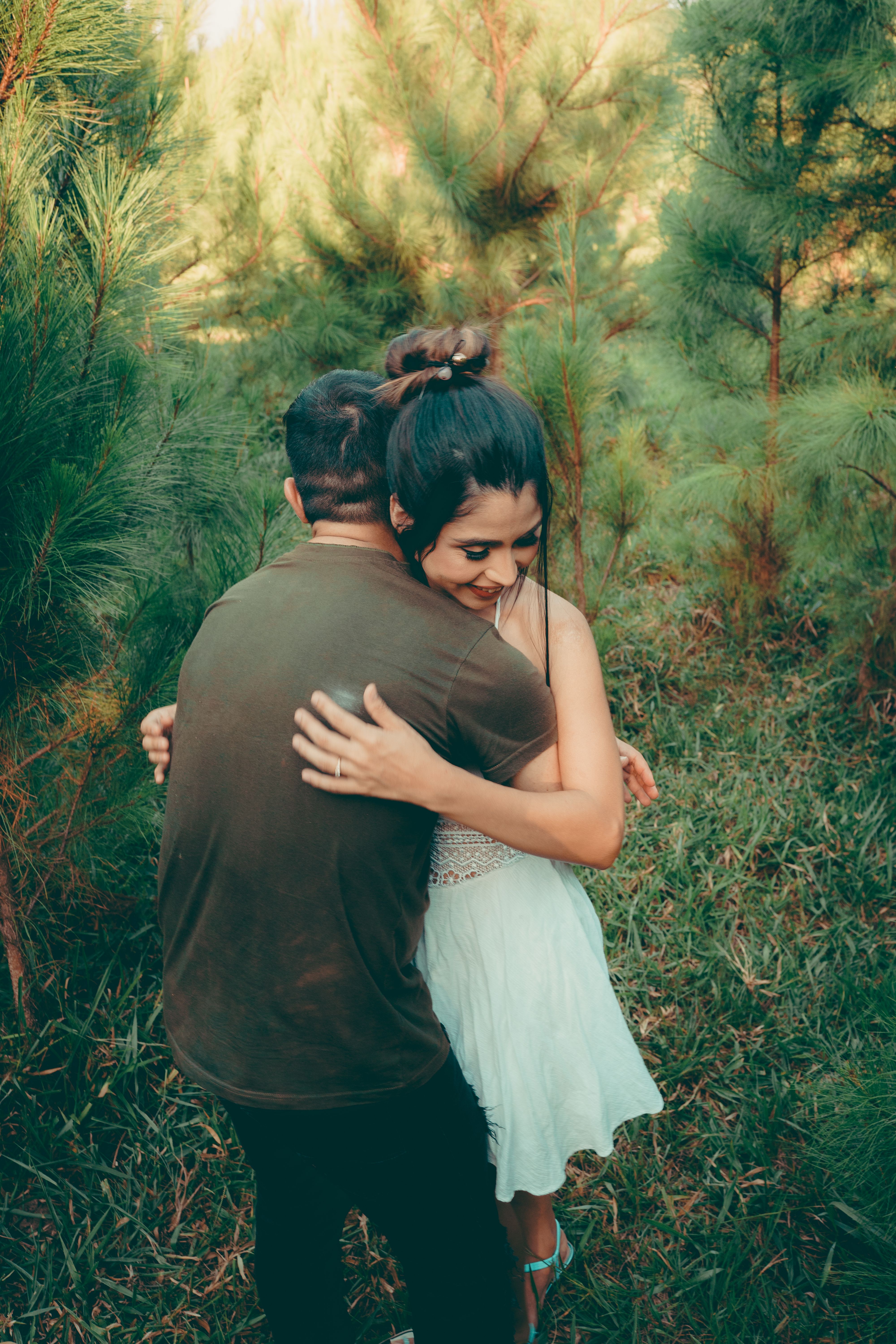 Woman and Man Hugging in Forest · Free Stock Photo