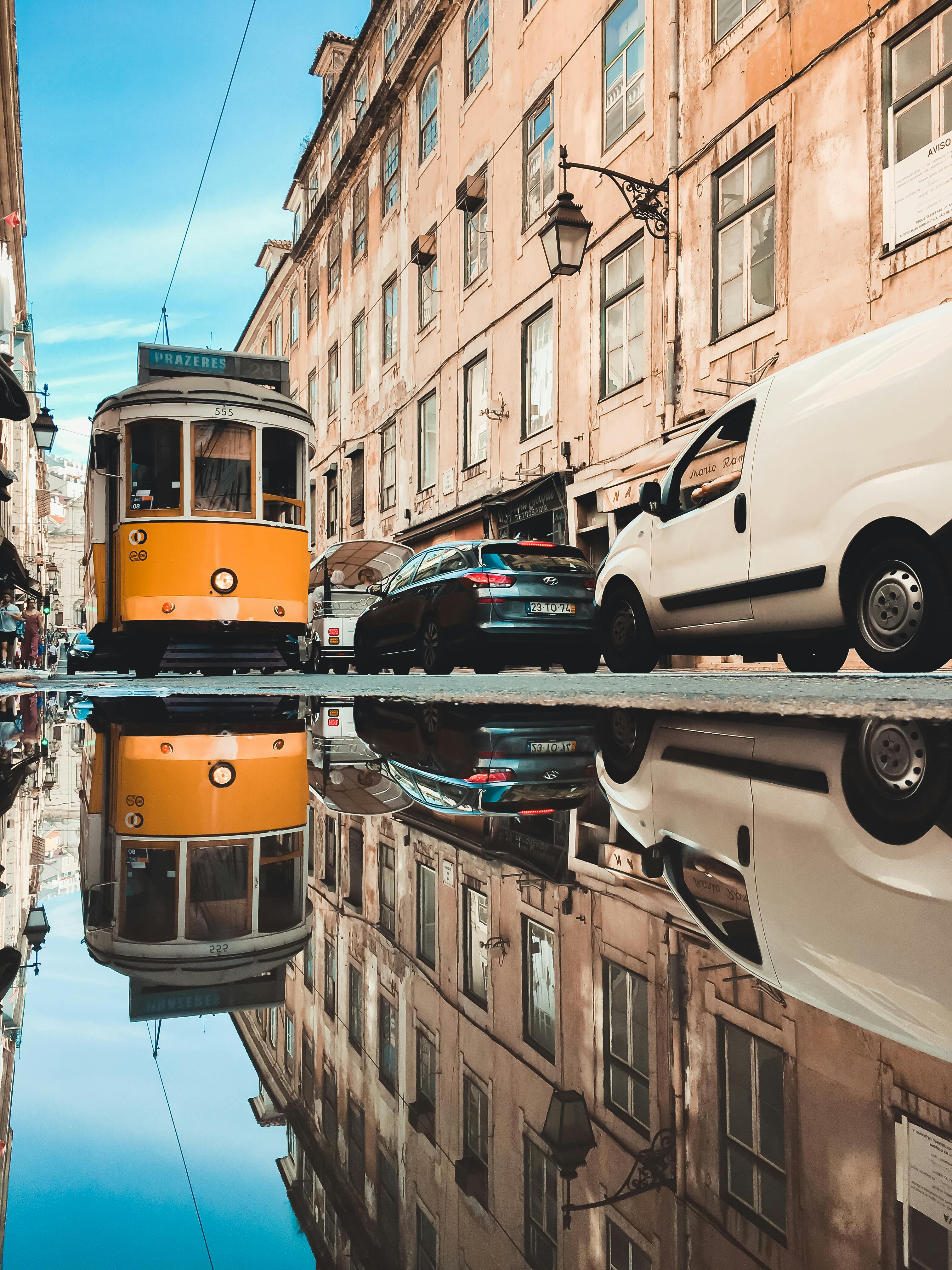 Reflection of Tram in Puddle