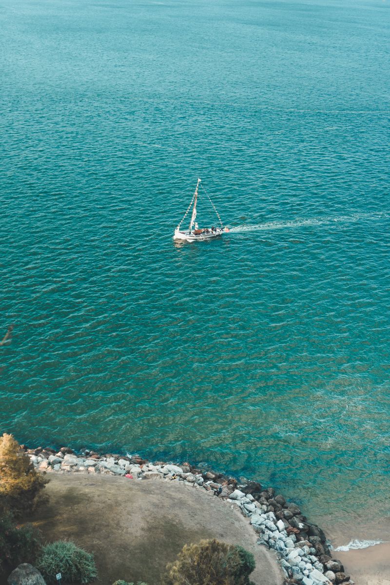 Luxury yacht running fast across open sea