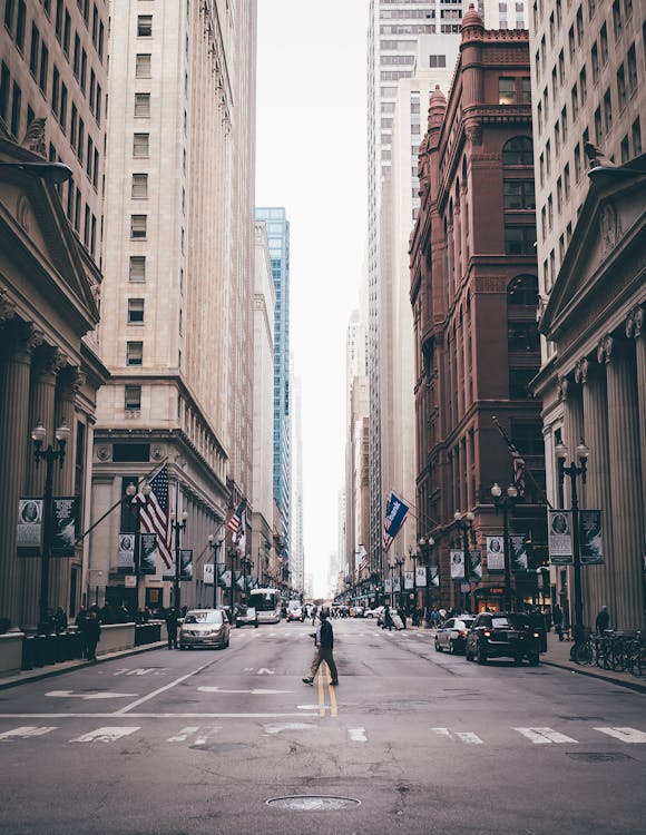 Person crossing the street in a big city