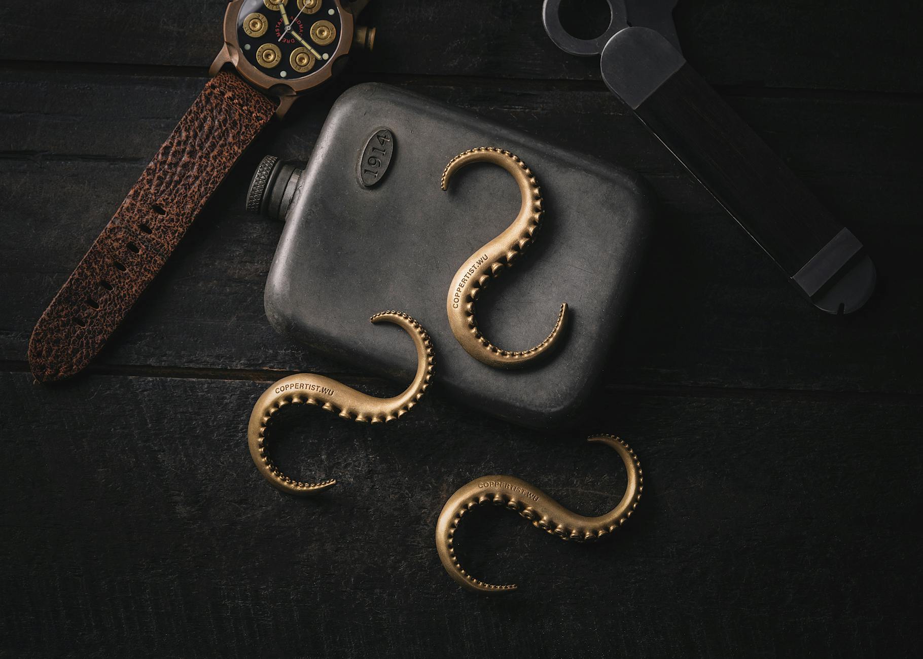 Octopus Tentacle Hooks and a Vintage Flask