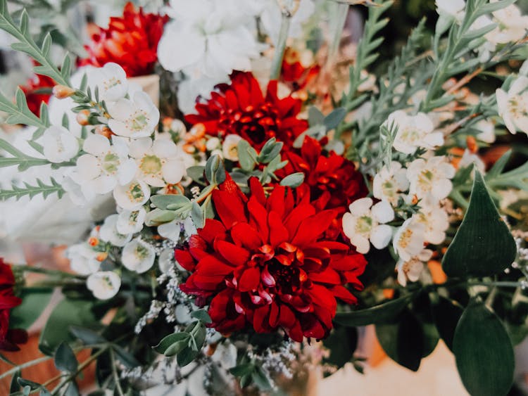 Bouquet Of Flowers Lying On A Shiny Surface