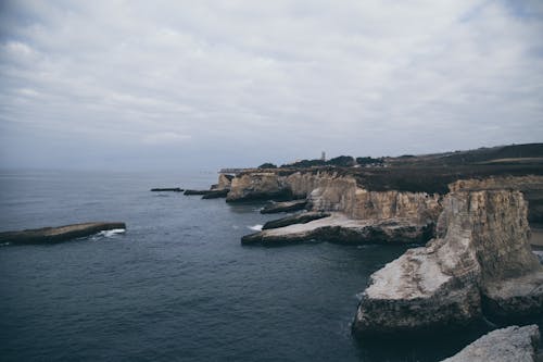 Clouds over Cliffs on Sea Shore