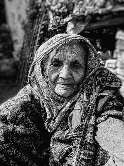 Portrait of an Elderly Woman Wearing Headscarf 