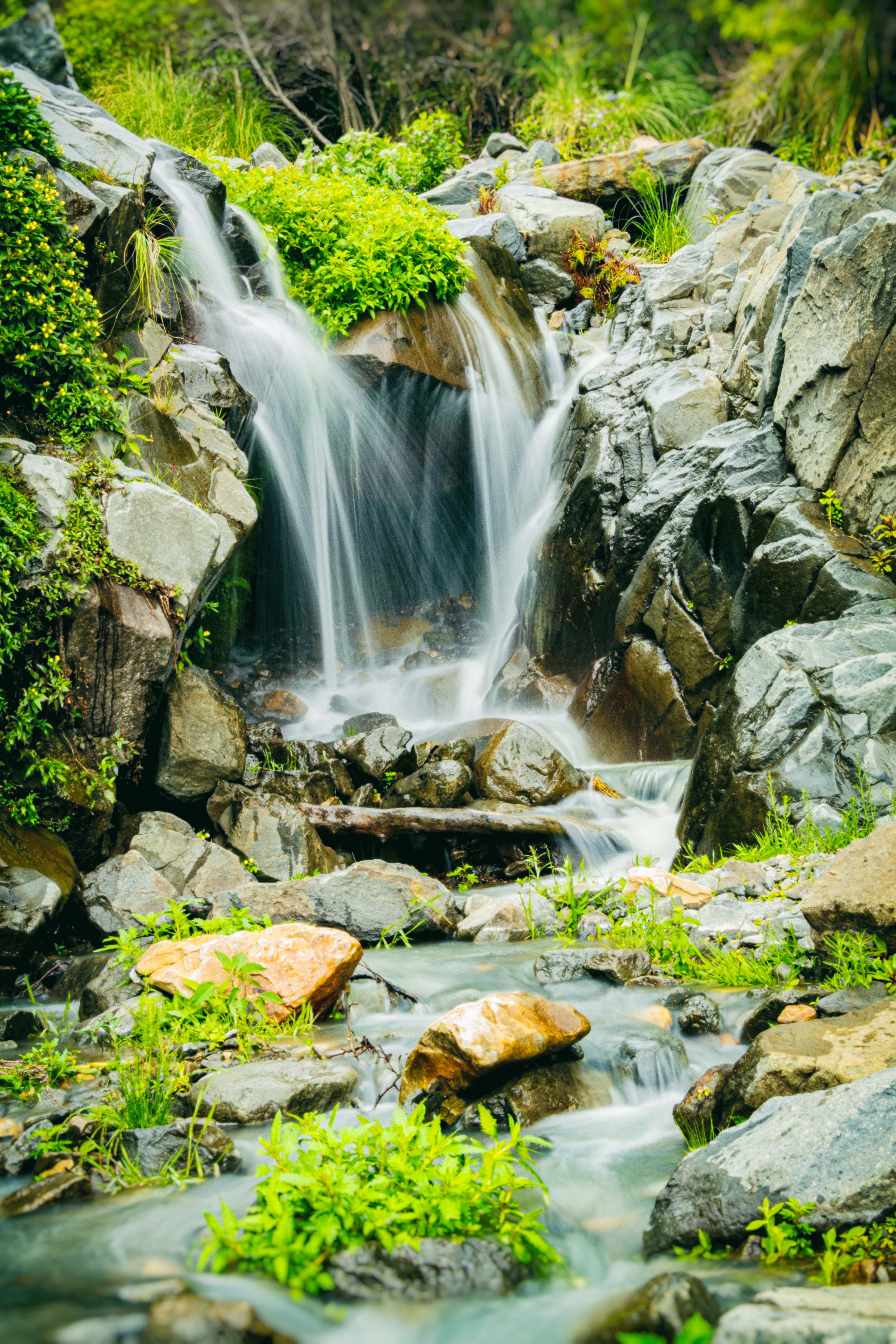 Rocks around Waterfall · Free Stock Photo