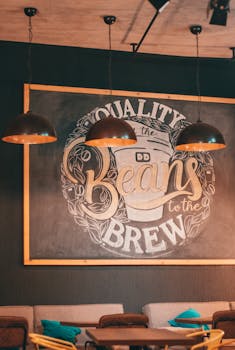 Warm cafe setting featuring chalkboard art with cozy seating.