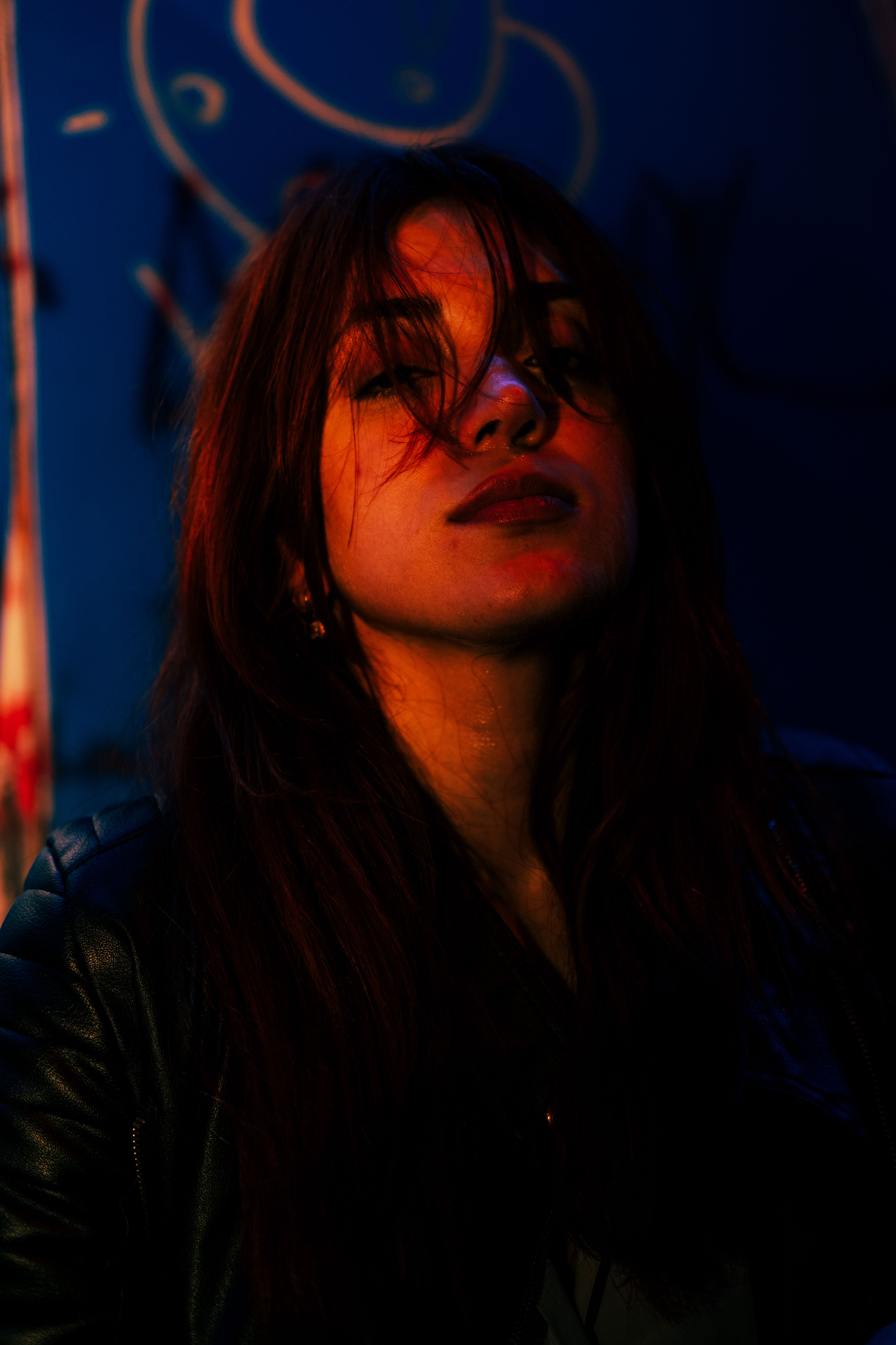 Portrait of a Woman in a Dark Room · Free Stock Photo
