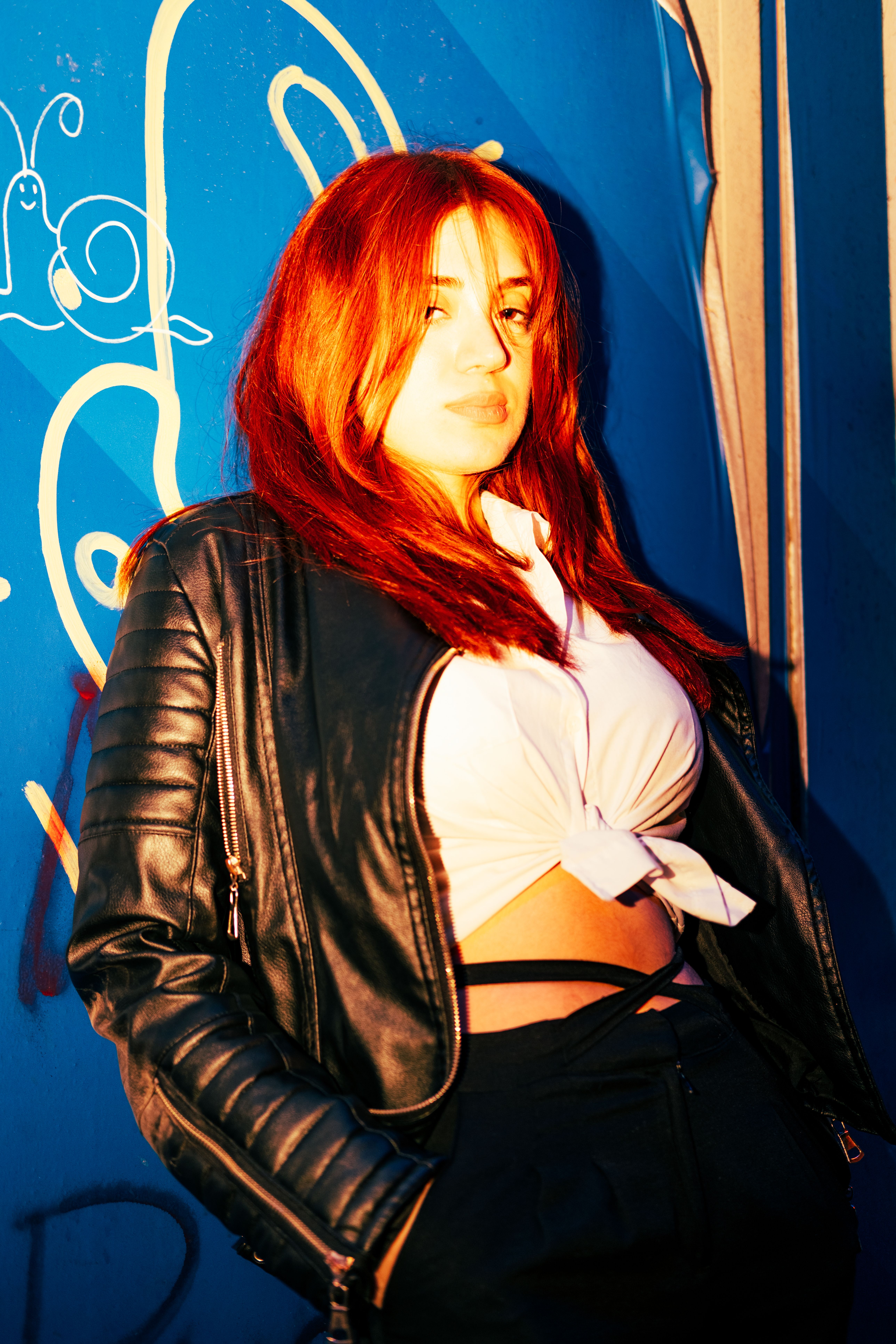 Woman Posing in Black Jacket · Free Stock Photo