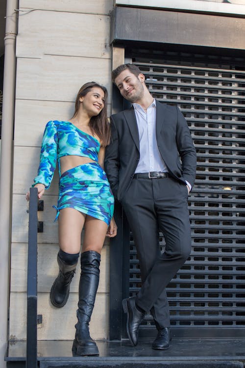 Woman i Platform Boots Posing with Man in Suit