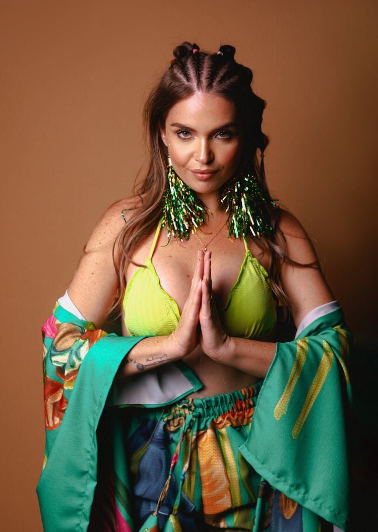 Standing Women With Folded Hands In Prayer