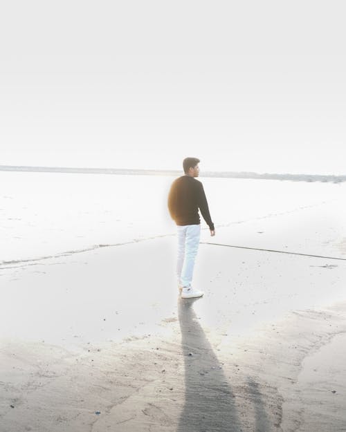 Man on Beach at Sunset