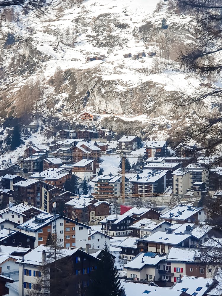 Town Under Hill In Winter