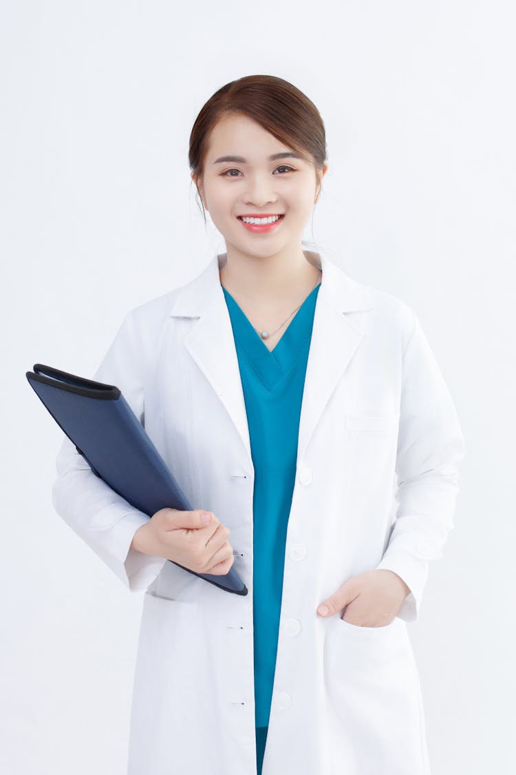 Smiling Doctor With File