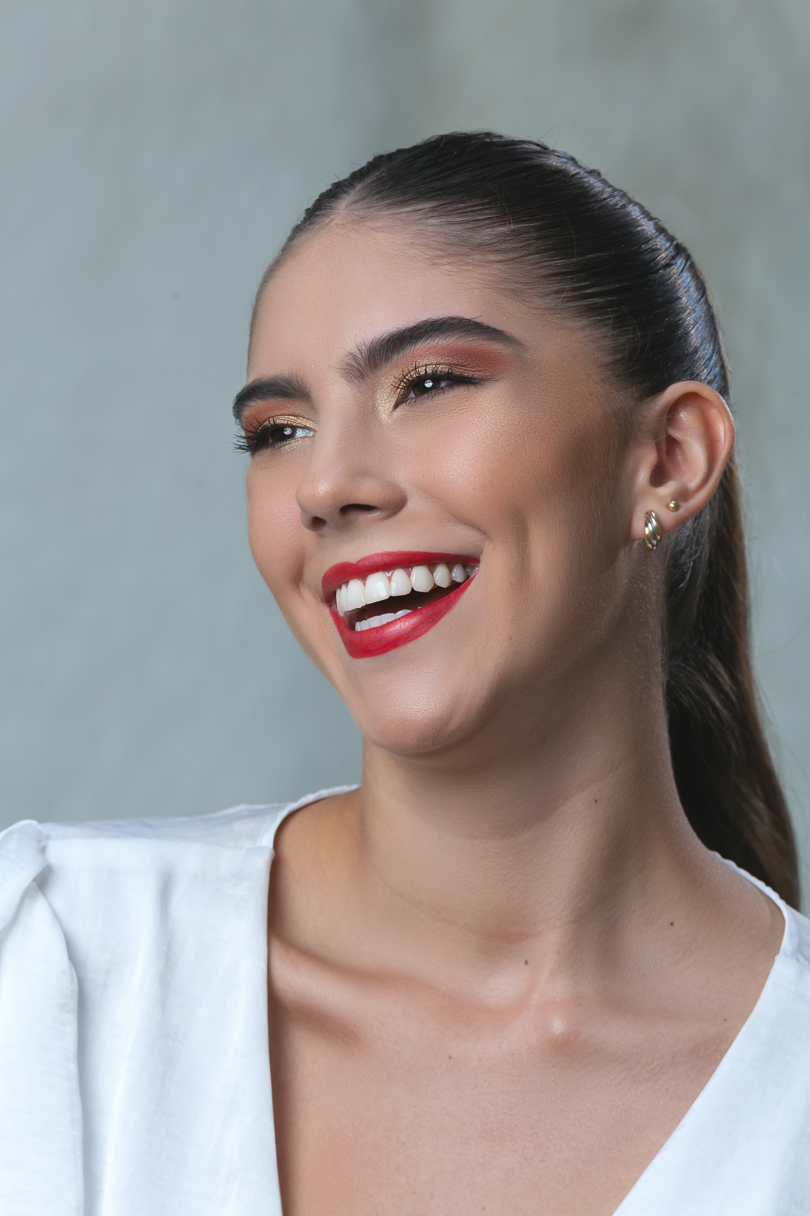 Portrait of a Young Woman Wearing Red Lipstick Smiling · Free Stock Photo