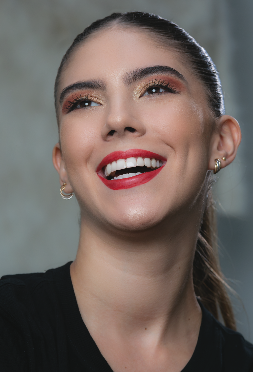 Patient beaming with a confident, radiant smile