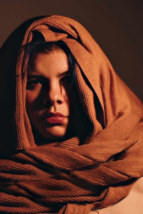 Woman Wearing a Brown Headscarf 